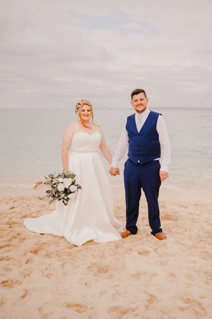 Hand in hand, the wedding pose you'll want to hand on the wall