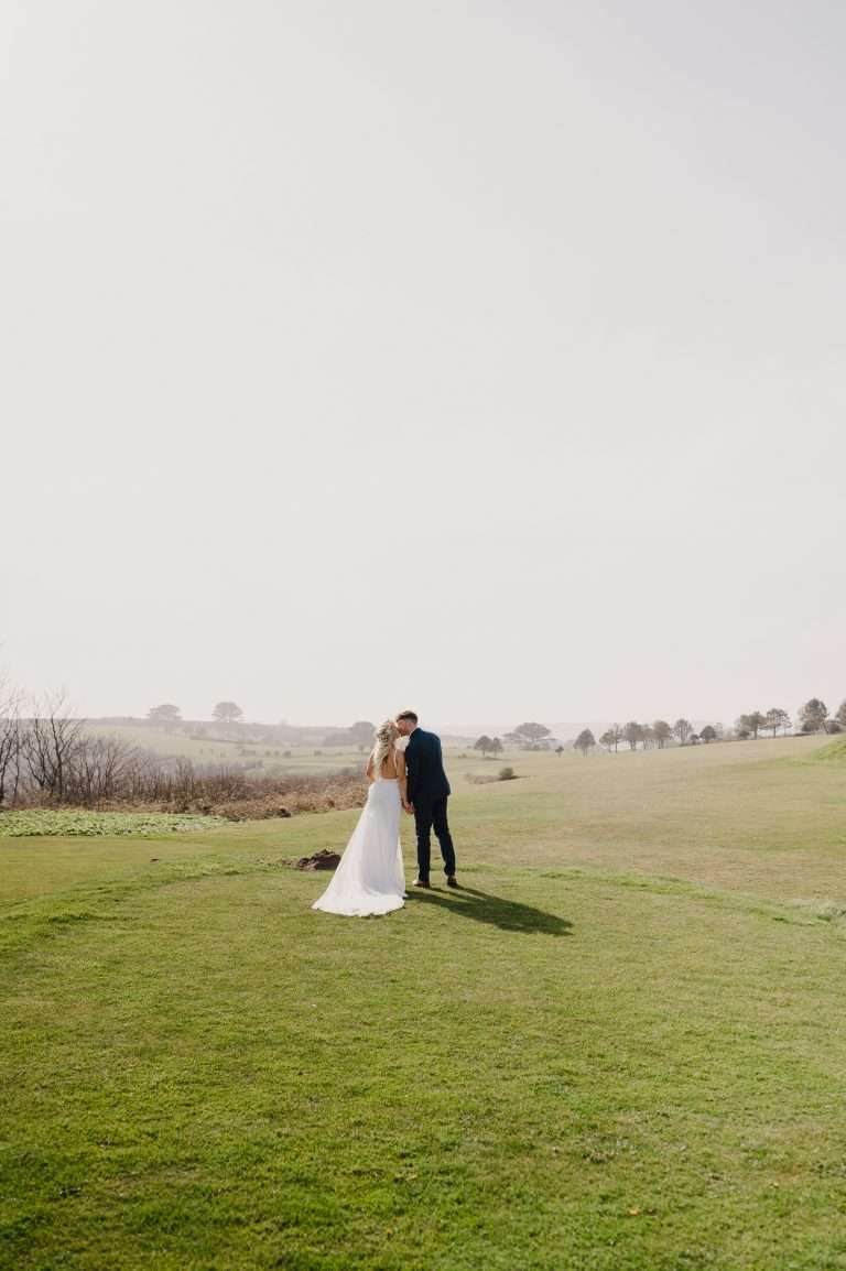 Wedding Couple kiss at Above The Bay Wedding Venue in Falmouth, Cornwall