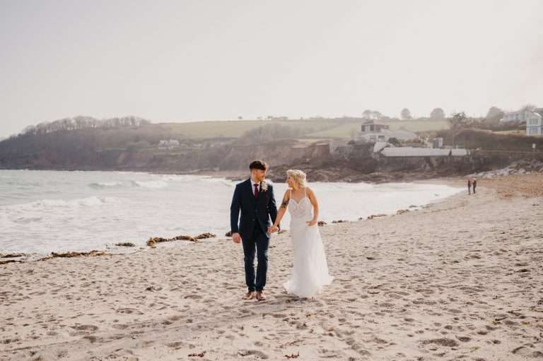 Walking along Swanpool beach, Falmouth. Just below Above The Bay wedding venue in Falmouth, Cornwall