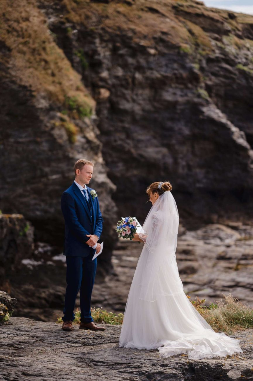 Wedding VS Elopement - The Difference | Cornwall Wedding Photographer | Bride and Groom on coastal rocks at Beacon Crag