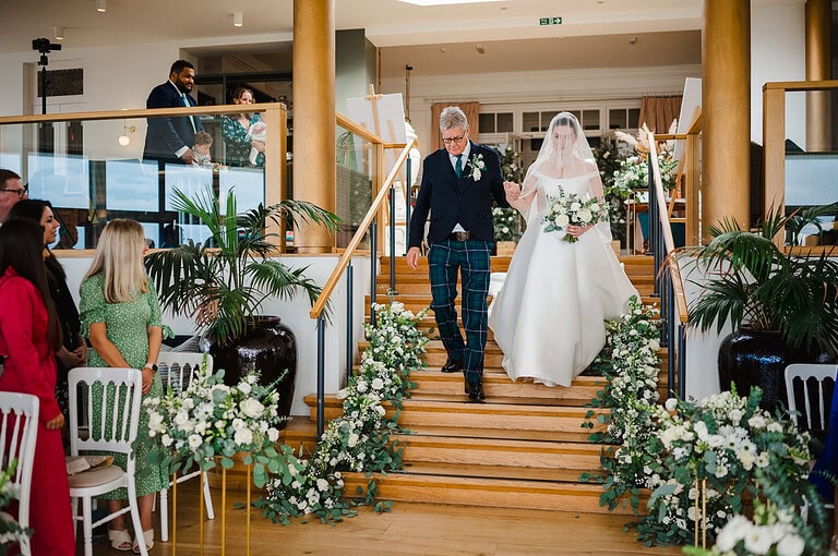 Father and Daughter Walking down the wedding aisle at The Polurrian