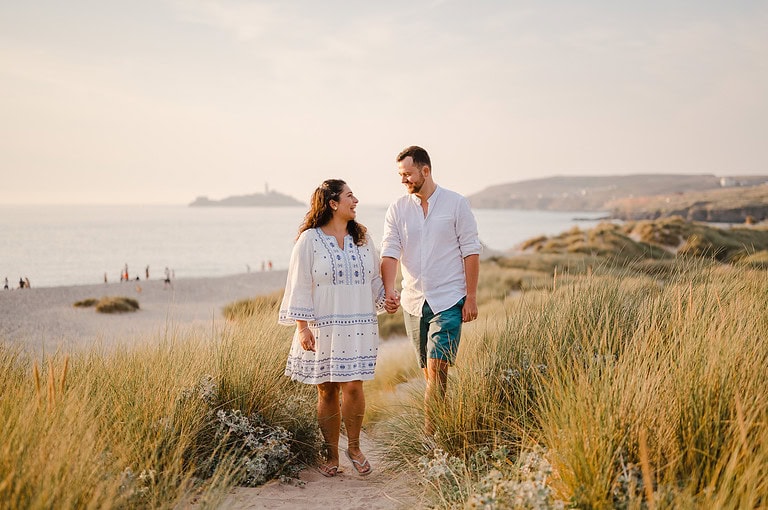 Happy couple celebrate their engagement with a photo shoot at Godrevy, Cornwall, by Cornwall Engagement Photographer, Jake Timms Photography