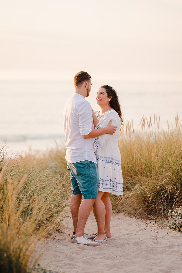 The air is full of laughter as the happy couple stare lovingly into each others eyes