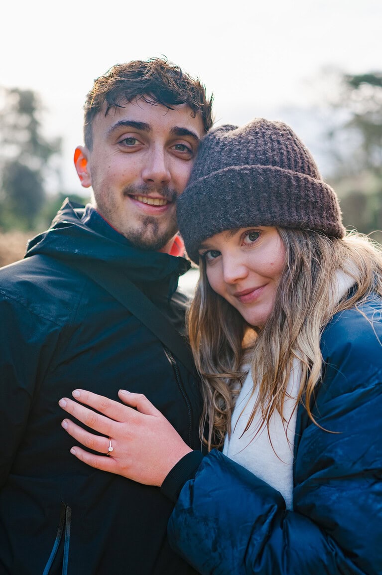 The happy couple smiling as they enjoy getting engaged at Trebah Gardens, Taken by Cornwall Engagement Photographer, Jake Timms Photography