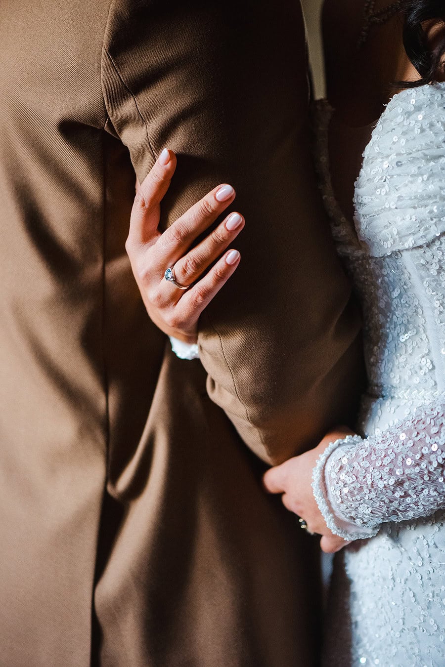 Arms wrapped around each other