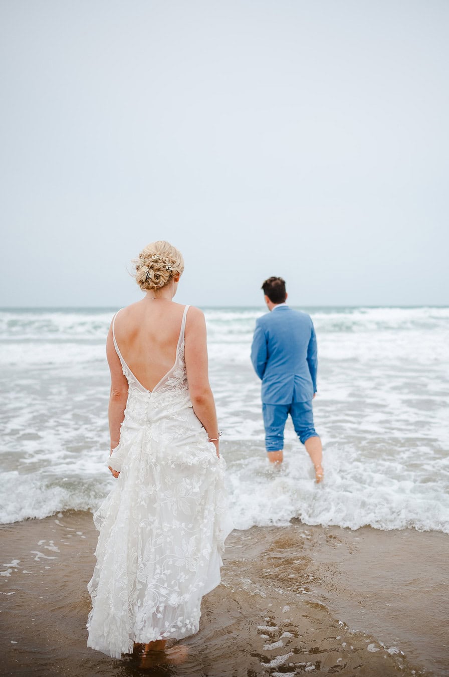 Taking a step in the sea to celebrate getting married