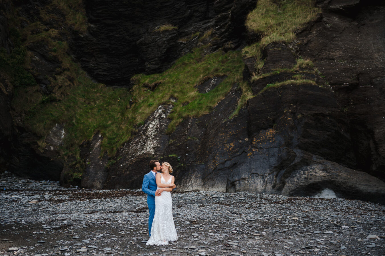 Bride and groom celebratting their elopement on a beach in Devon - Elopement Portfolio