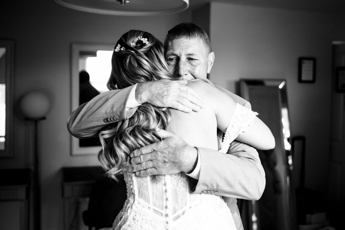 Sharing a hug on your wedding morning - Wedding album
