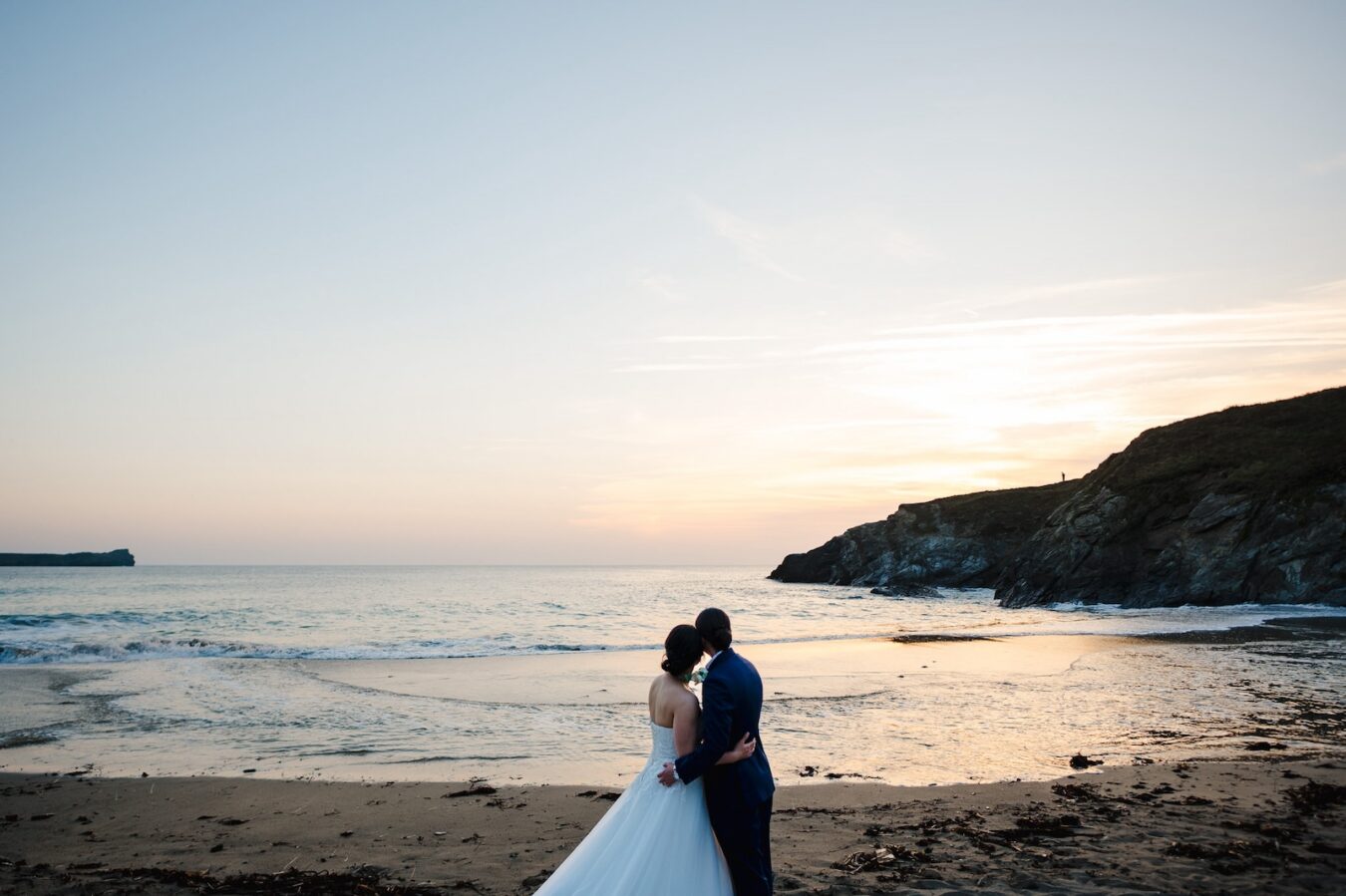 Watching the sunset on a beautiful seaside wedding in Cornwall - Wedding Album